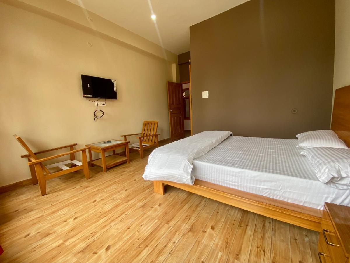 Hotel Mansarovar Inn Munsyari ภายนอก รูปภาพ