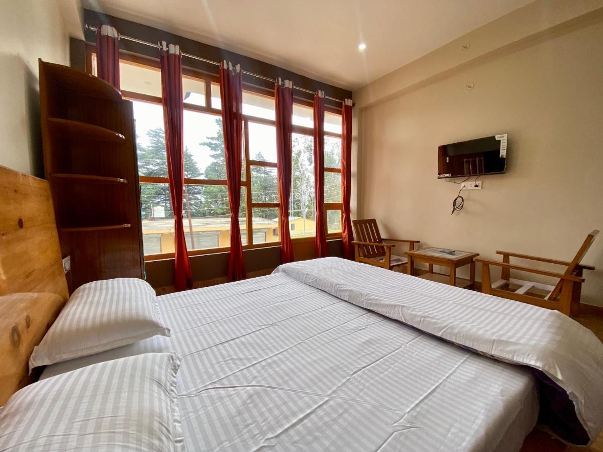 Hotel Mansarovar Inn Munsyari ภายนอก รูปภาพ