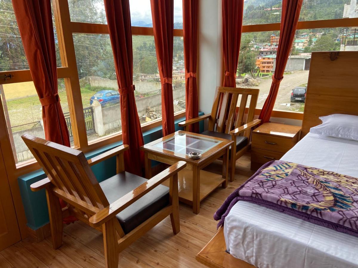 Hotel Mansarovar Inn Munsyari ภายนอก รูปภาพ