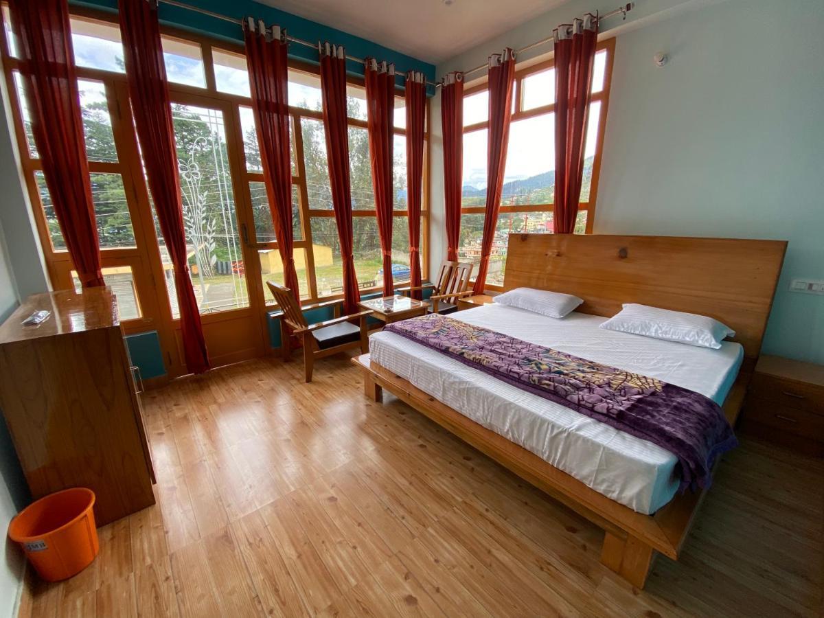 Hotel Mansarovar Inn Munsyari ภายนอก รูปภาพ
